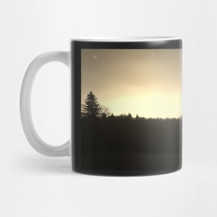 Sunset over a forest in Switzerland Mug